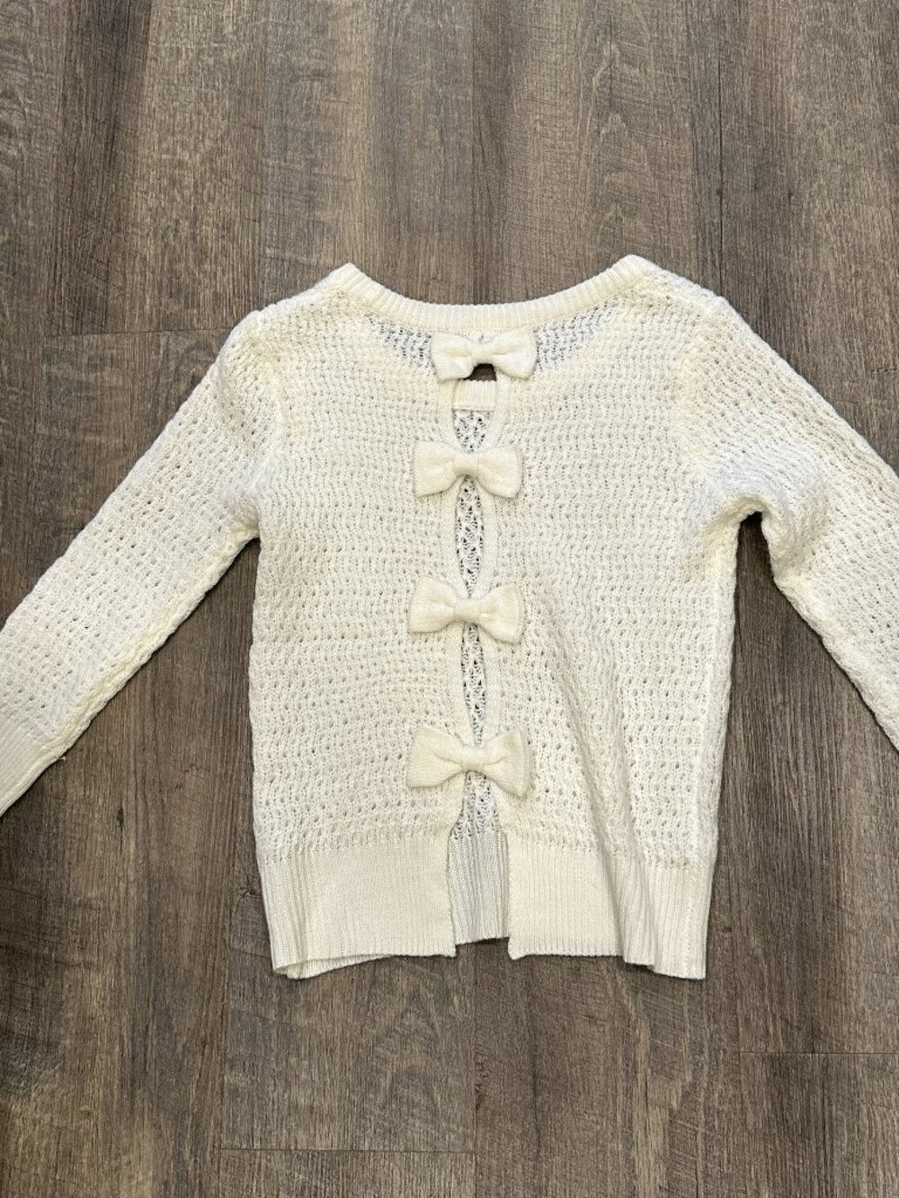 NWOT Delias Ivory Sweater 4 Bows at Open Back Stretch Loose Knit Womens Sz Small
